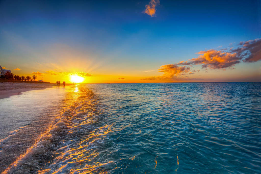 Why a TCI Tropical Sunset is Best Enjoyed with Surf TCI