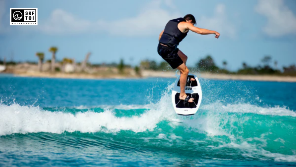 man wake foiling on water