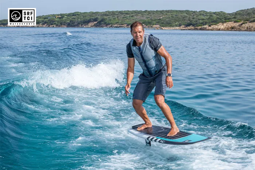 man having fun wakefoiling